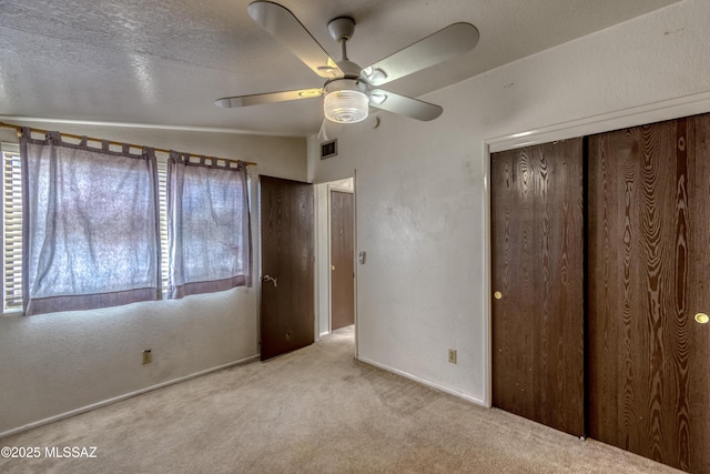 2777 N Treat Ave, Tucson, AZ 85716 - unfurnished bedroom with carpet flooring, a closet, baseboards, and ceiling fan