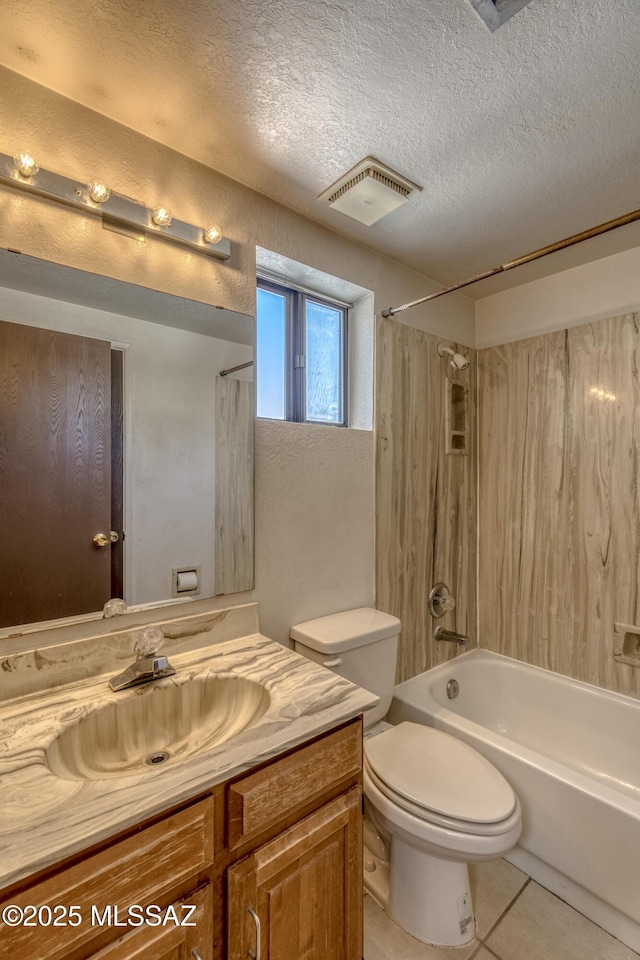 2777 N Treat Ave, Tucson, AZ 85716 - full bath with tile patterned floors, a textured ceiling, bathing tub / shower combination, vanity, and toilet