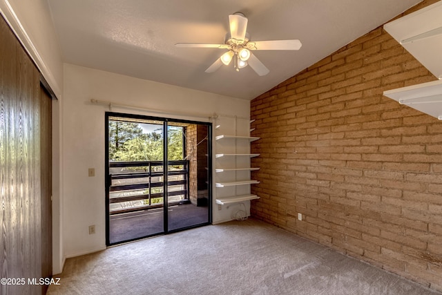 2777 N Treat Ave, Tucson, AZ 85716 - unfurnished room with brick wall, carpet, ceiling fan, and lofted ceiling