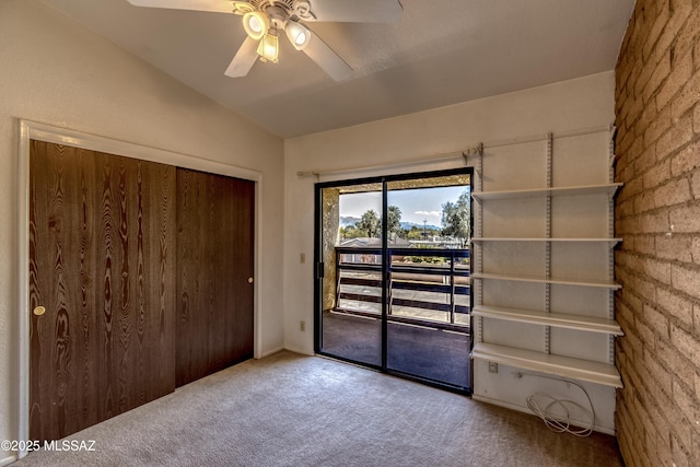 2777 N Treat Ave, Tucson, AZ 85716 - unfurnished bedroom with access to exterior, carpet floors, lofted ceiling, a closet, and a ceiling fan