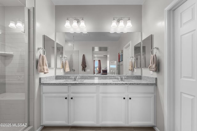 17303 S Nicholas Falls Dr, Vail, AZ 85641 - bathroom featuring double vanity and tiled shower