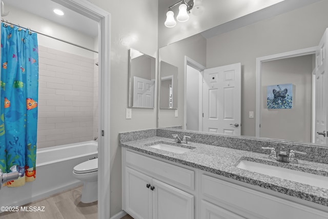 17303 S Nicholas Falls Dr, Vail, AZ 85641 - full bathroom with shower / bath combo, toilet, double vanity, and wood finished floors
