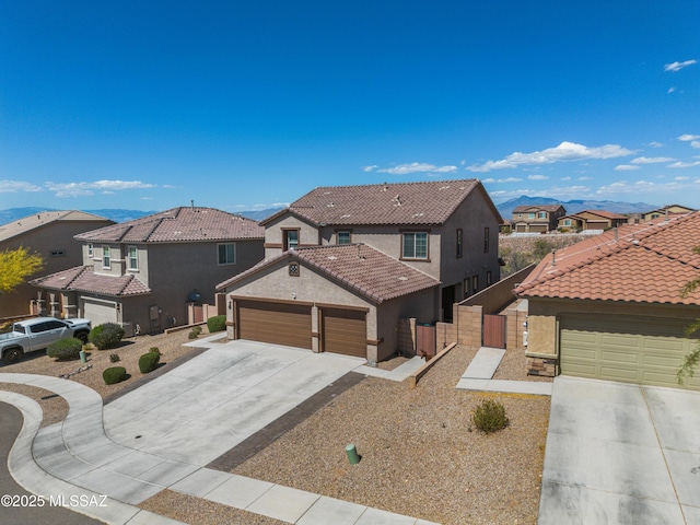 17303 S Nicholas Falls Dr, Vail, AZ 85641 - mediterranean / spanish-style house featuring driveway, stucco siding, and a residential view