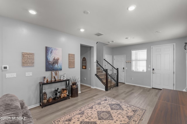 17303 S Nicholas Falls Dr, Vail, AZ 85641 - entrance foyer with light wood-style floors, stairway, baseboards, and recessed lighting