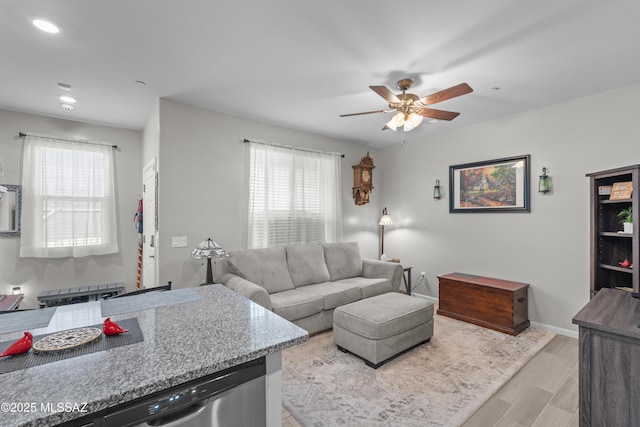 17303 S Nicholas Falls Dr, Vail, AZ 85641 - living area with a ceiling fan, light wood-type flooring, recessed lighting, and baseboards