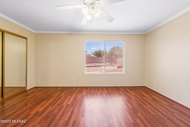 8892 E Apache Well Pl, Tucson, AZ 85730 - spare room featuring wood finished floors, ornamental molding, baseboards, and a ceiling fan