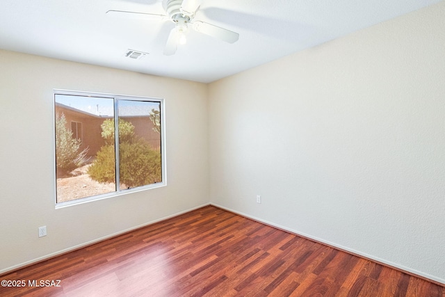 8892 E Apache Well Pl, Tucson, AZ 85730 - unfurnished room featuring wood finished floors and a ceiling fan