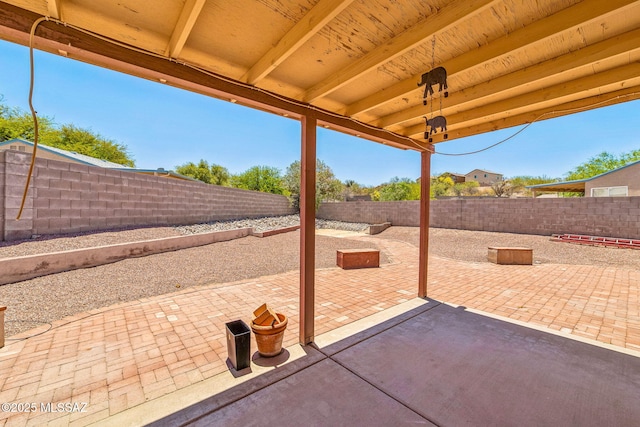 8892 E Apache Well Pl, Tucson, AZ 85730 - view of patio / terrace featuring a fenced backyard