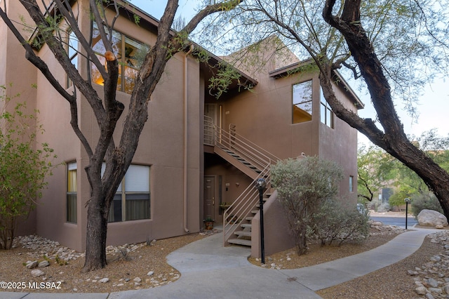 view of building exterior with stairway