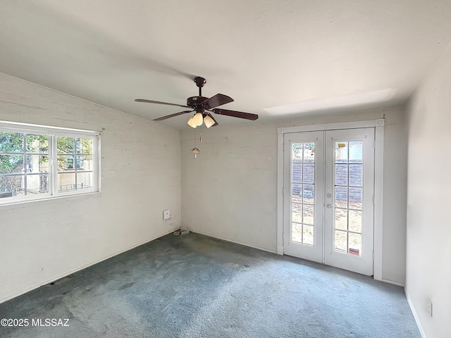 919 W 3rd Ave, San Manuel, AZ 85631 - unfurnished room featuring french doors, carpet flooring, and a ceiling fan