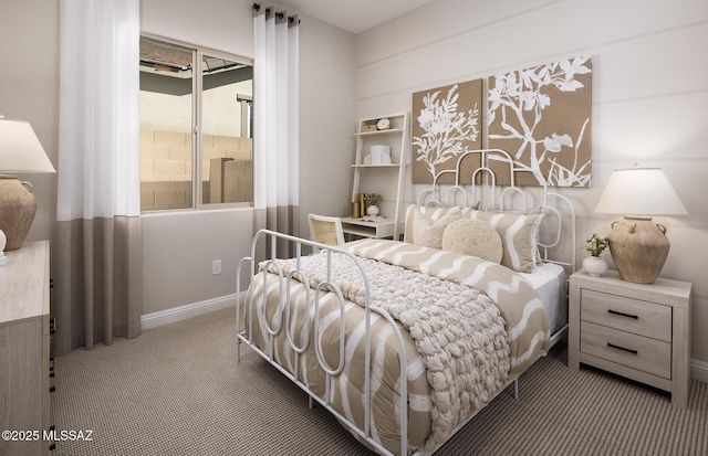 carpeted bedroom with baseboards