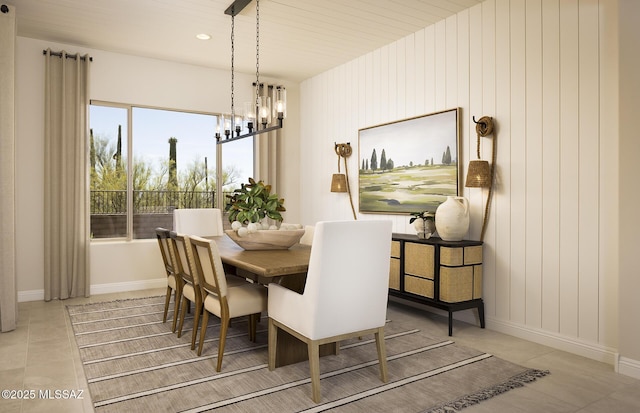 dining space with a chandelier, baseboards, tile patterned floors, and recessed lighting