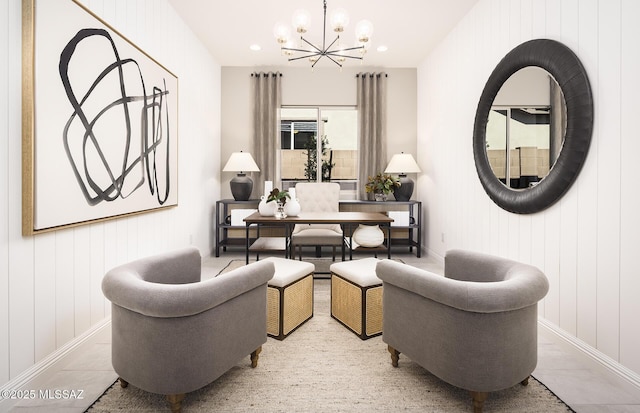 living area featuring a chandelier, baseboards, and recessed lighting