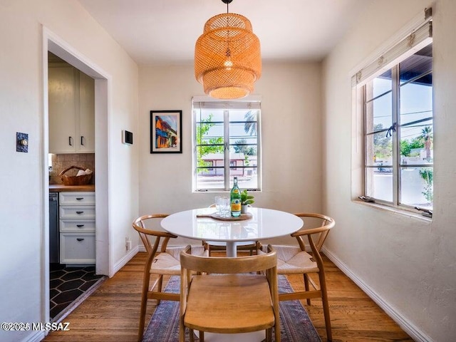 1700 N Winstel Blvd, Tucson, AZ 85716 - dining area featuring light wood-style flooring, plenty of natural light, and baseboards