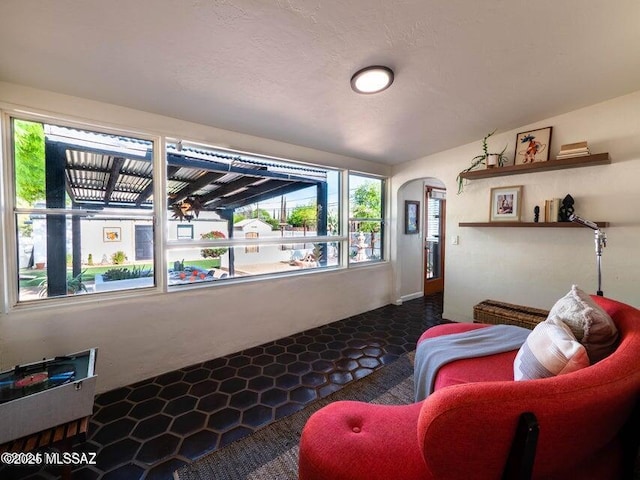 1700 N Winstel Blvd, Tucson, AZ 85716 - living area with arched walkways and lofted ceiling