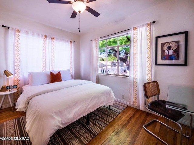 1700 N Winstel Blvd, Tucson, AZ 85716 - bedroom with hardwood / wood-style floors and a ceiling fan