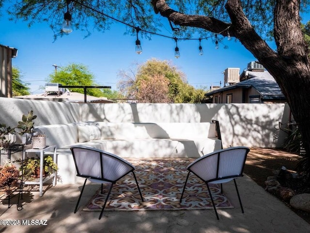 1700 N Winstel Blvd, Tucson, AZ 85716 - view of patio / terrace featuring central AC unit and fence