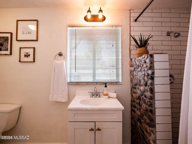1700 N Winstel Blvd, Tucson, AZ 85716 - full bath with a tile shower, vanity, and toilet
