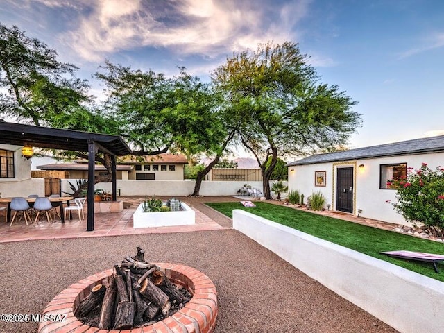 1700 N Winstel Blvd, Tucson, AZ 85716 - view of yard with an outdoor fire pit and a patio area