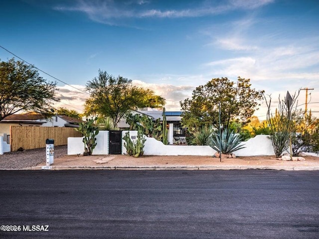 1700 N Winstel Blvd, Tucson, AZ 85716 - view of property hidden behind natural elements with a fenced front yard