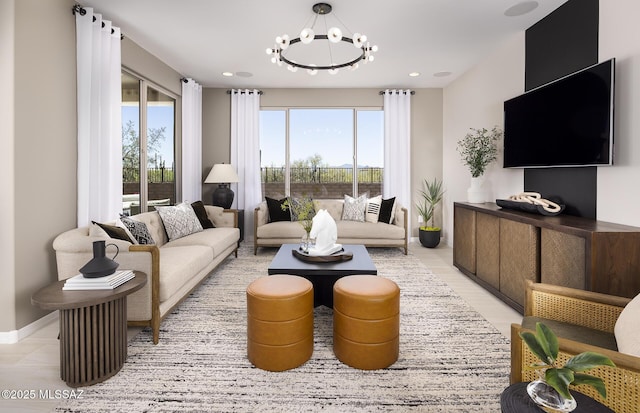 living area featuring a chandelier, baseboards, and recessed lighting