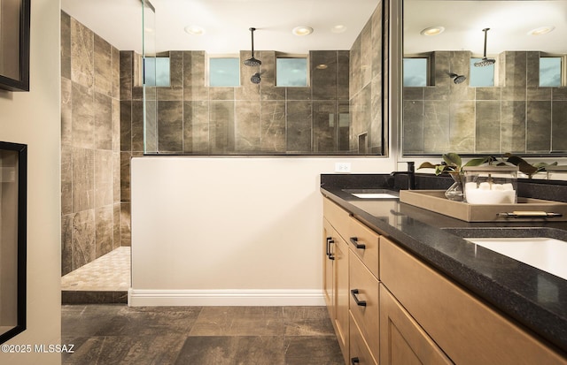 13478 E Silverra Pl, Tucson, AZ 85747 - bathroom featuring walk in shower and double vanity