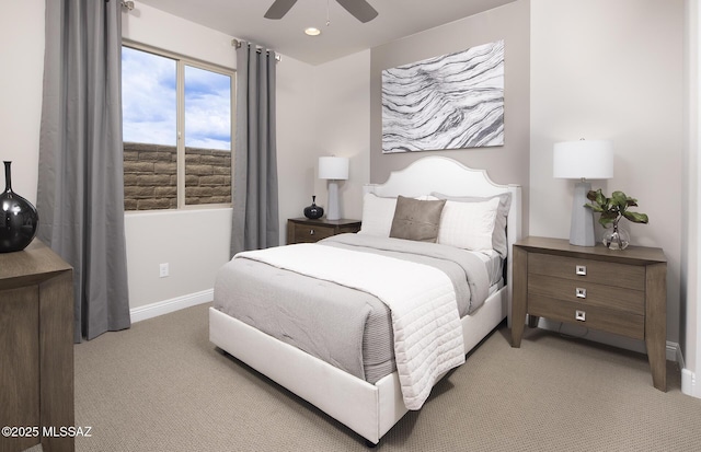 13478 E Silverra Pl, Tucson, AZ 85747 - bedroom with light carpet, baseboards, and ceiling fan