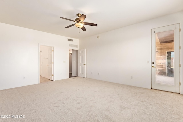 13940 E Hay Bale Trl, Vail, AZ 85641 - unfurnished bedroom featuring carpet, ceiling fan, and ensuite bathroom