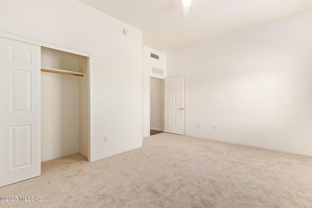 13940 E Hay Bale Trl, Vail, AZ 85641 - unfurnished bedroom featuring carpet and a closet
