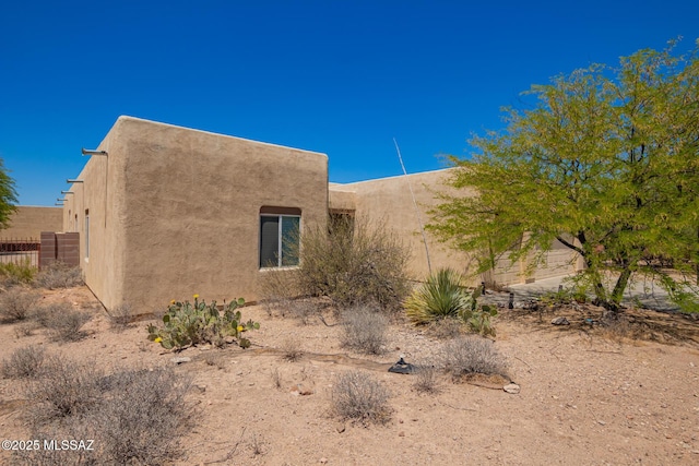13940 E Hay Bale Trl, Vail, AZ 85641 - view of side of property featuring stucco siding
