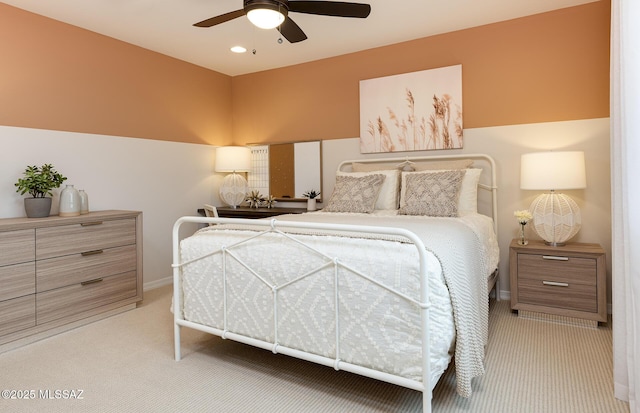 bedroom featuring light colored carpet, baseboards, ceiling fan, and recessed lighting
