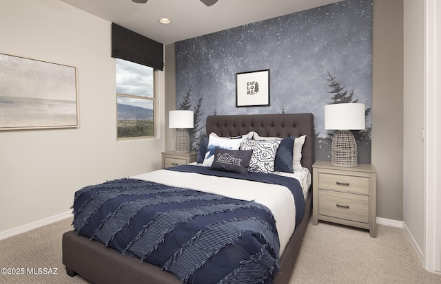bedroom featuring an accent wall, carpet, baseboards, and recessed lighting