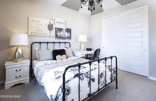 bedroom featuring carpet flooring, a closet, and baseboards