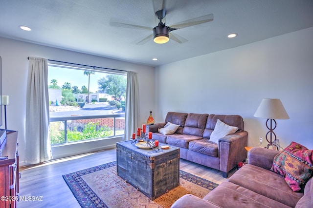 957 N Camino Las Solanas, Tucson, AZ 85710 - living room with wood finished floors, a ceiling fan, and recessed lighting