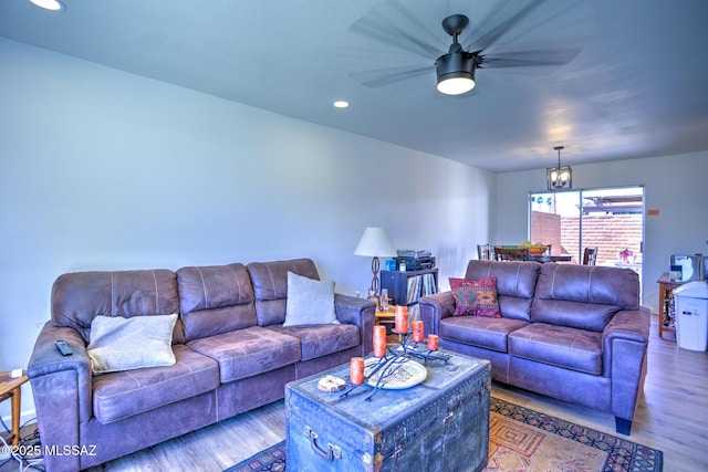 957 N Camino Las Solanas, Tucson, AZ 85710 - living area with wood finished floors, a chandelier, ceiling fan, and recessed lighting