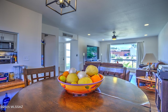 957 N Camino Las Solanas, Tucson, AZ 85710 - dining room featuring wood finished floors, recessed lighting, and ceiling fan