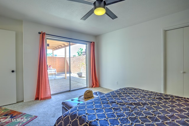 957 N Camino Las Solanas, Tucson, AZ 85710 - carpeted bedroom with access to exterior and ceiling fan