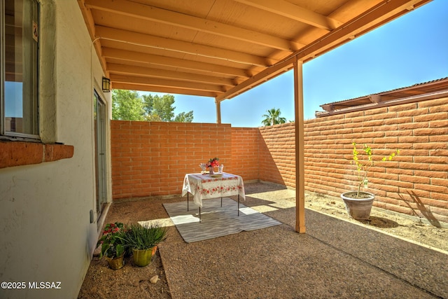 957 N Camino Las Solanas, Tucson, AZ 85710 - fenced backyard featuring a patio area