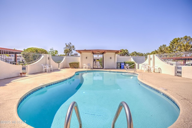 957 N Camino Las Solanas, Tucson, AZ 85710 - community pool with a patio area