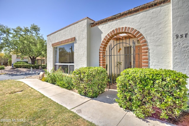 957 N Camino Las Solanas, Tucson, AZ 85710 - entrance to property featuring stucco siding