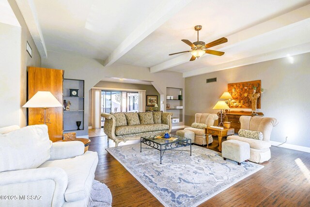 5800 N Placita Esplendora, Tucson, AZ 85718 - living area featuring beam ceiling, a ceiling fan, baseboards, dark wood-style flooring, and arched walkways