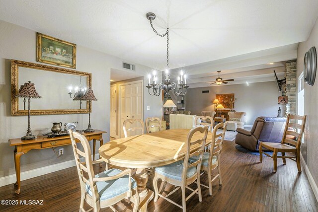 5800 N Placita Esplendora, Tucson, AZ 85718 - dining space featuring dark wood finished floors, a ceiling fan, baseboards, and a chandelier