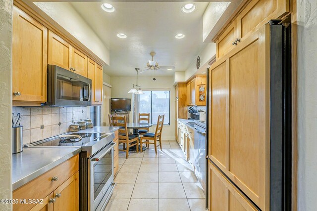 5800 N Placita Esplendora, Tucson, AZ 85718 - kitchen featuring stainless steel appliances, stainless steel counters, decorative backsplash, recessed lighting, and light tile patterned floors