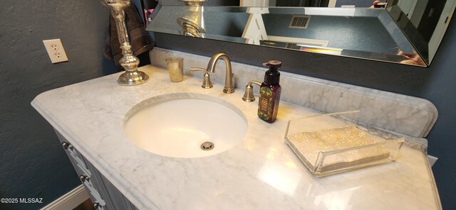 5800 N Placita Esplendora, Tucson, AZ 85718 - bathroom view of a textured wall and vanity