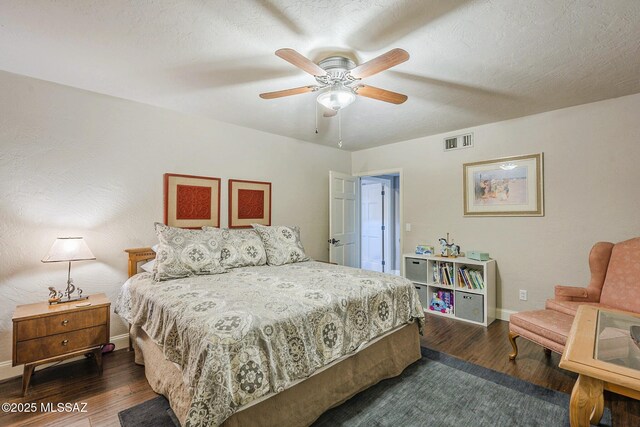 5800 N Placita Esplendora, Tucson, AZ 85718 - bedroom featuring wood finished floors, baseboards, and ceiling fan