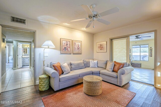 5800 N Placita Esplendora, Tucson, AZ 85718 - living area featuring ceiling fan, wood finished floors, baseboards, crown molding, and recessed lighting