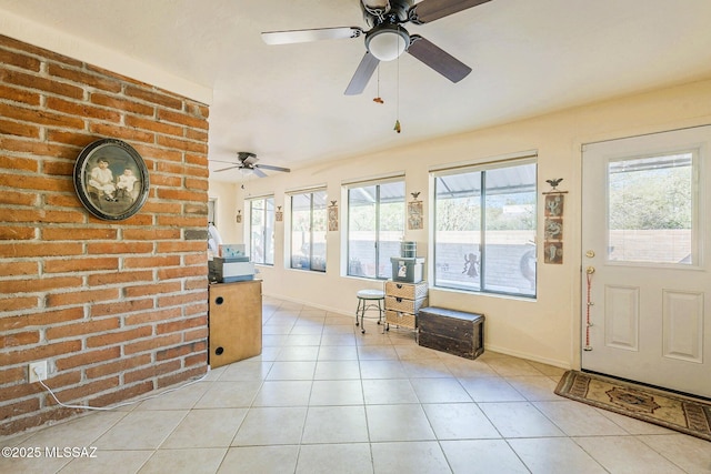 5800 N Placita Esplendora, Tucson, AZ 85718 - sunroom with ceiling fan, baseboards, and tile patterned flooring