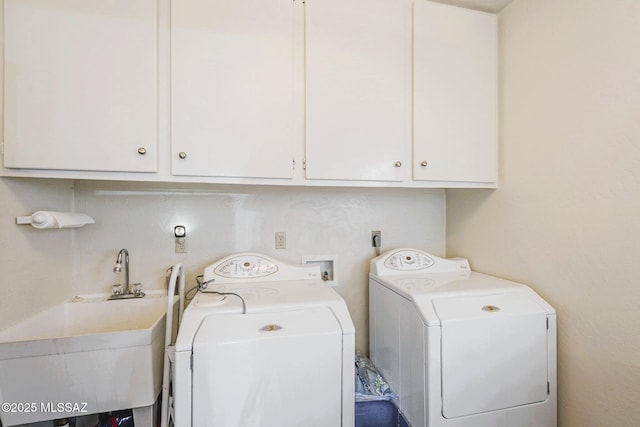 5800 N Placita Esplendora, Tucson, AZ 85718 - clothes washing area featuring cabinet space and separate washer and dryer