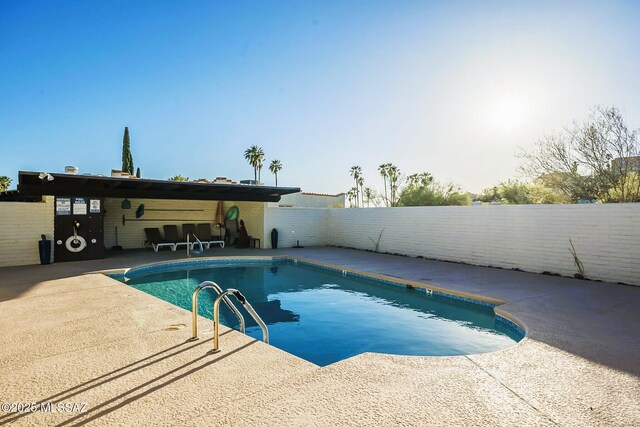 5800 N Placita Esplendora, Tucson, AZ 85718 - view of swimming pool with a fenced backyard and a patio area
