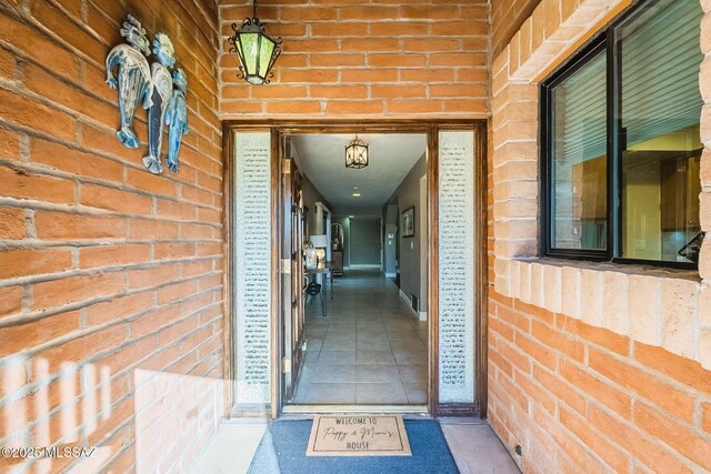 5800 N Placita Esplendora, Tucson, AZ 85718 - view of exterior entry featuring brick siding